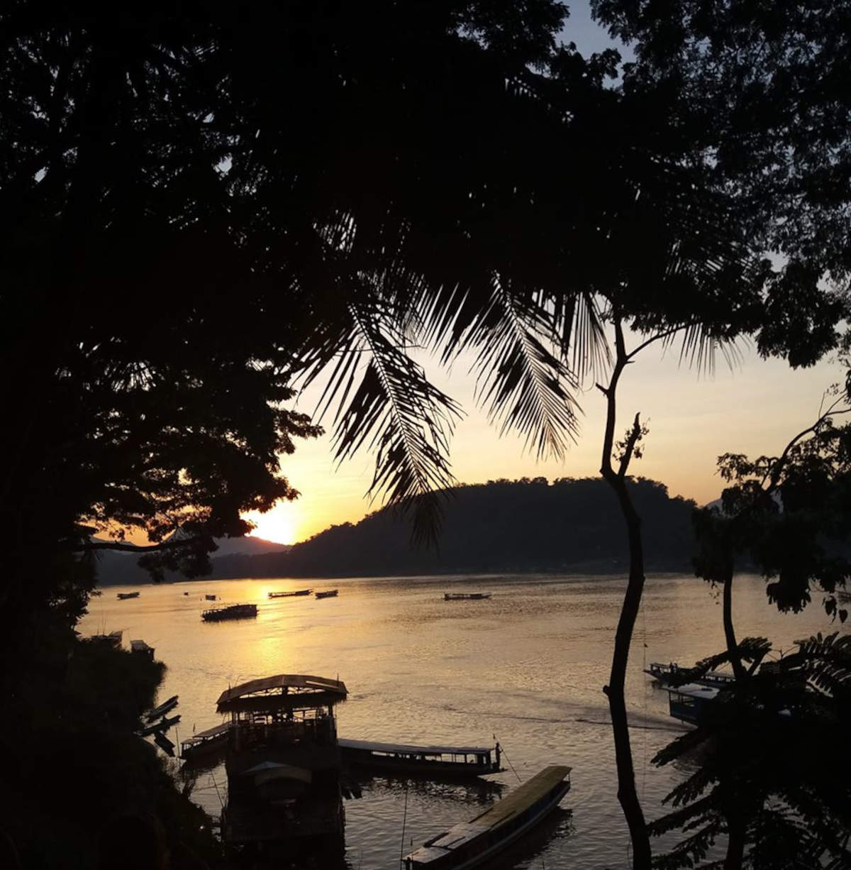 Vacanze in inverno in Laos: Tramonto sul Mekong a Luang Prabang